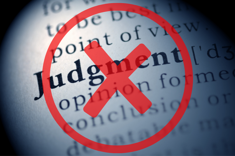The word judgement bolded on a piece of paper with synonyms written around it representing the judgement free zone with the Pinnacle Wellness Group's Suboxone Treatment Program.