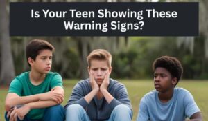 Three concerned preteen boys sitting outdoors; one looks anxious with hands on face. Text overlay reads: Early Signs of Addiction: What Parents Should Watch For.